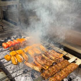 A mouthwatering selection of Turkish kebabs and meats grilling over charcoal at Zula Grill, the best grill restaurant in Hackney.